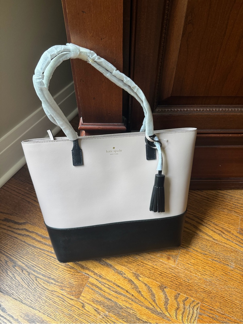 kate spade Black and Cream Colorblock Tote with Tassel